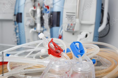 Fotografie Blood tubes with hemodialysis machine in the background