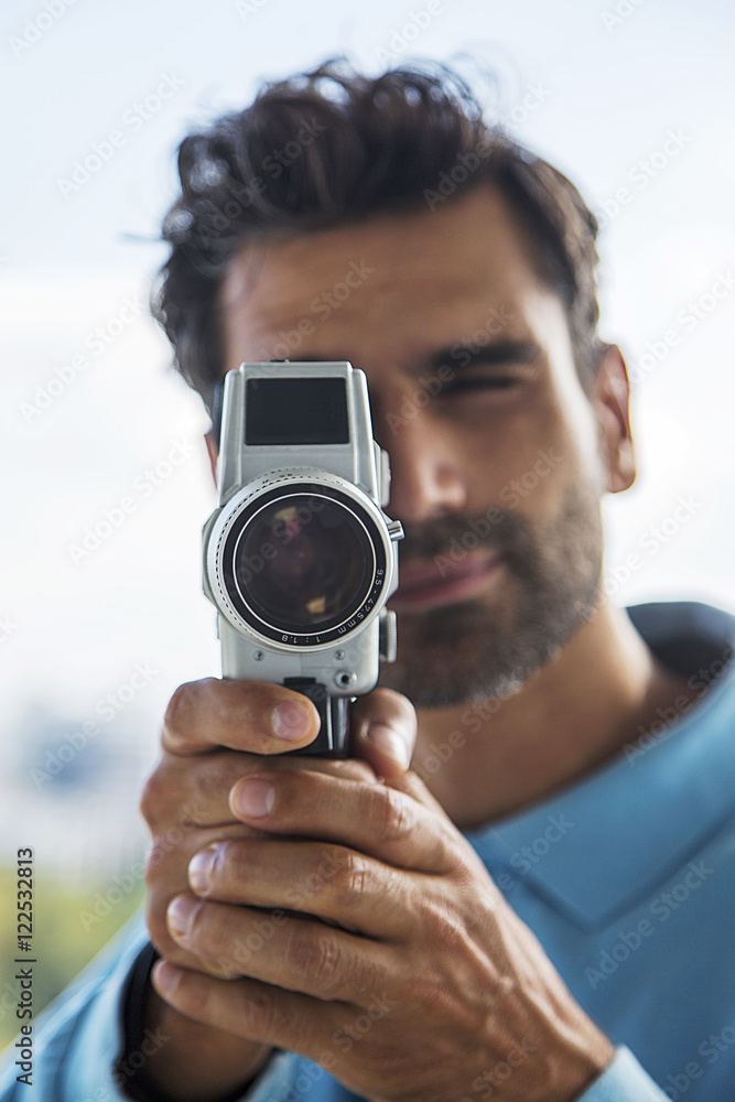 Obraz premium Man with camera