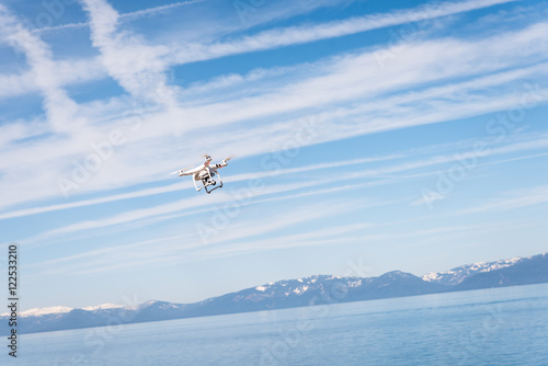 Drone hovering over lake Tahoe waters