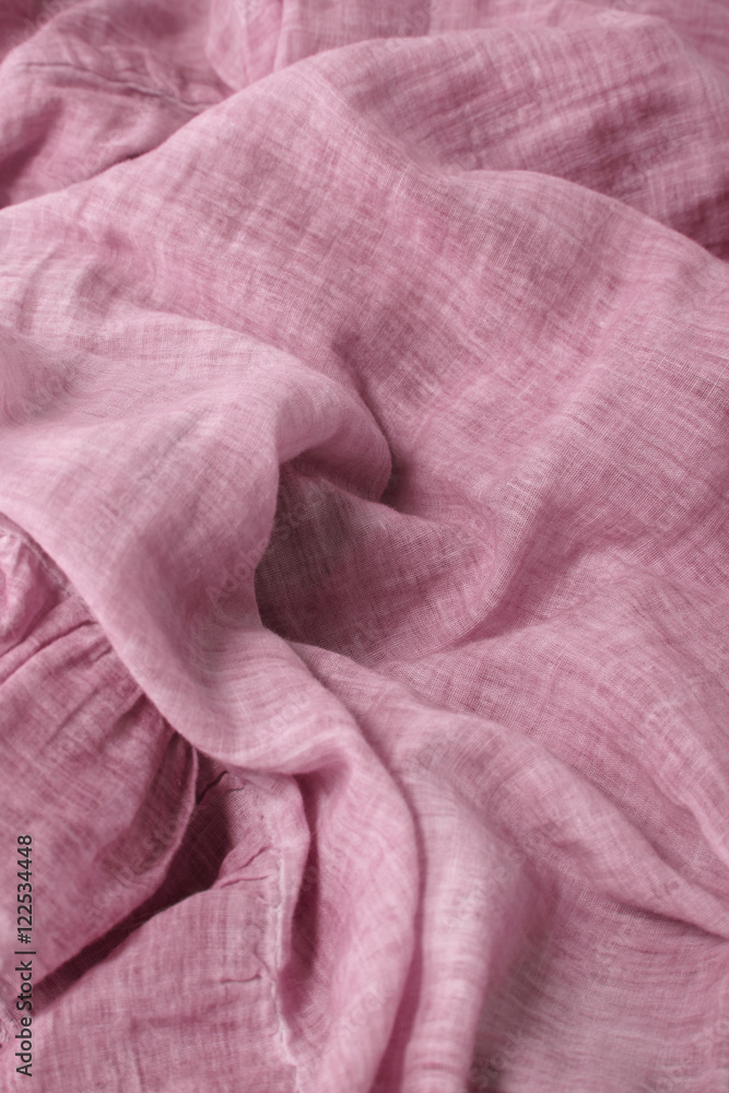 A full page of soft pink linen fabric background texture A full page of soft pink linen fabric background texture