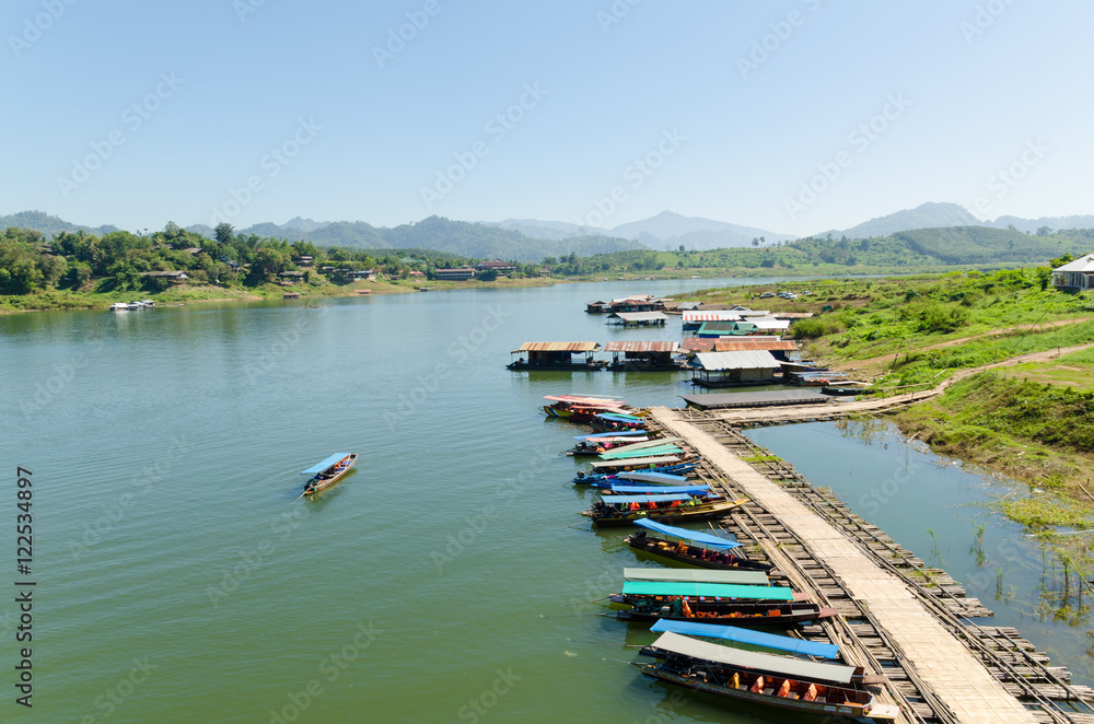 Naklejka premium Boats on local made bamboo float, Kanchanaburi, Thailand