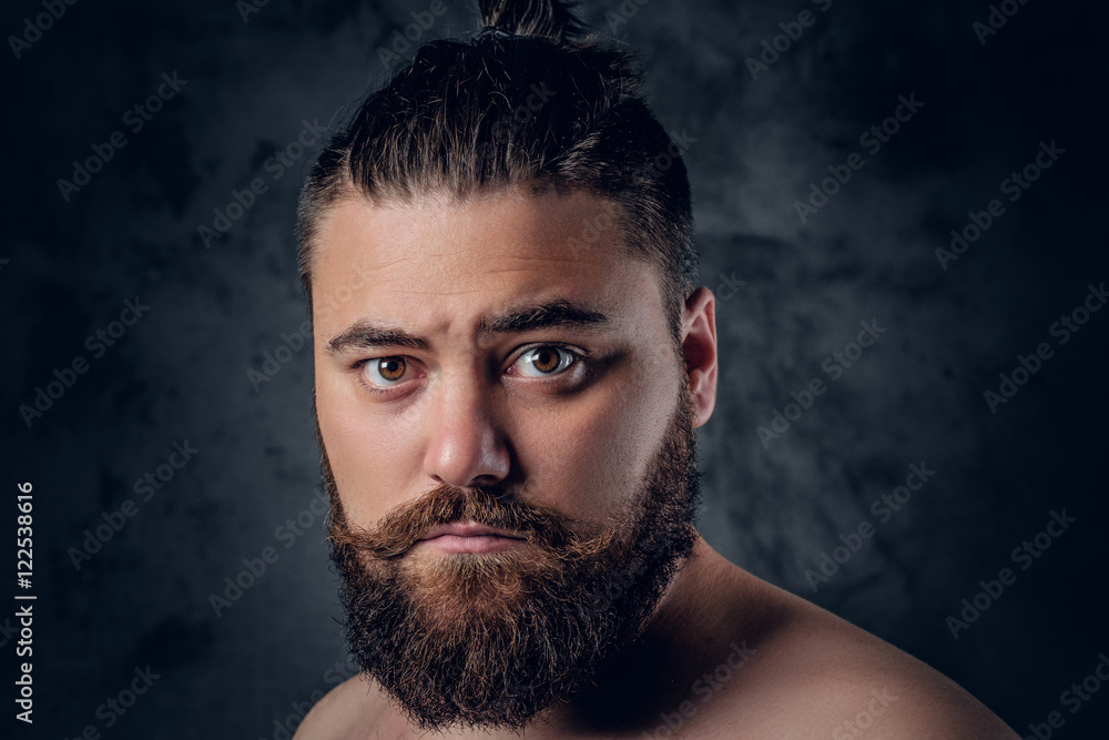 Bearded male on grey background. Bearded male on grey background.
