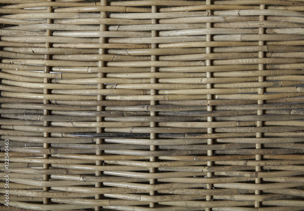 A full page of a neutral basket weave background texture A full page of a neutral basket weave background texture