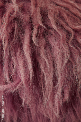A full page close up of red furry background texture