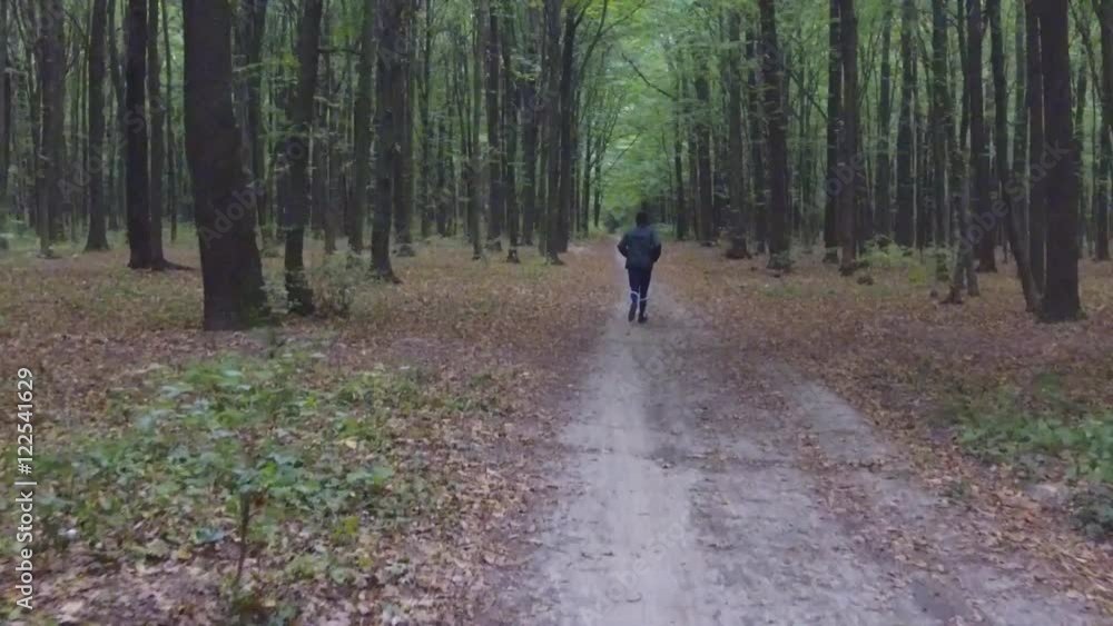 running man in the woods running man in the woods