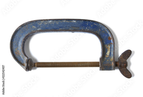 A metal wood working clamp isolated on a white background
