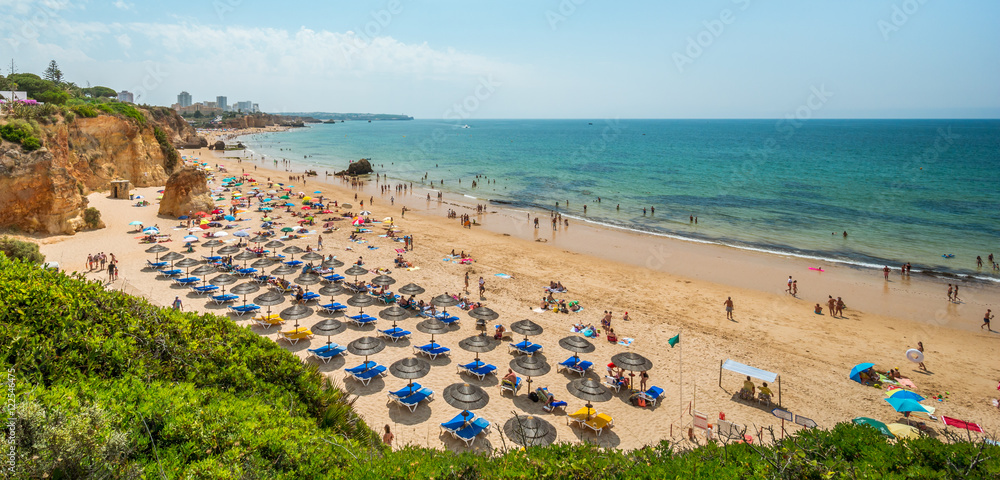 Fototapeta premium Summer holidays in Alvor beach, Portimao, Algarve