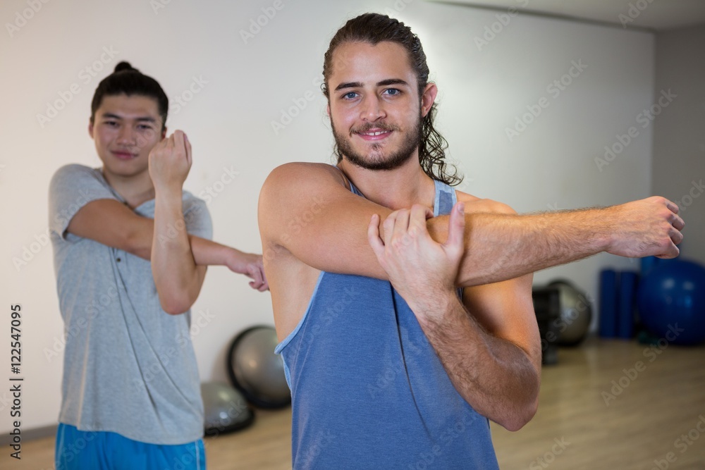 Smiling two men doing aerobic exercise Smiling two men doing aerobic exercise