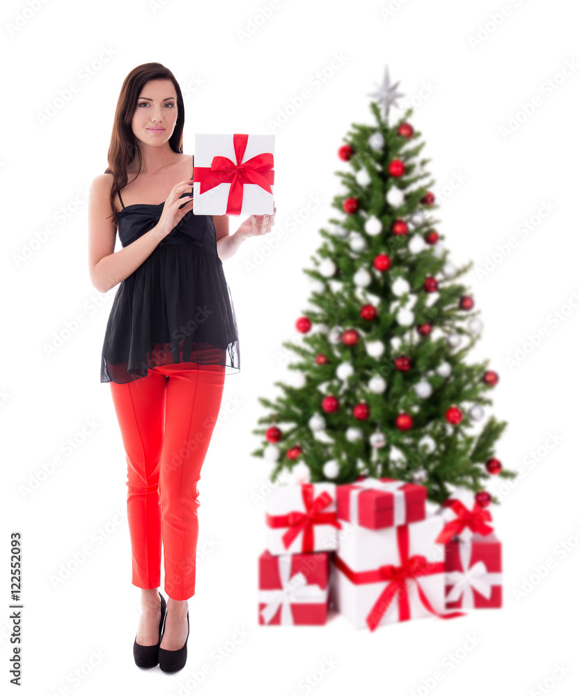 Fototapeta premium portrait of young woman with gift box and christmas tree isolate