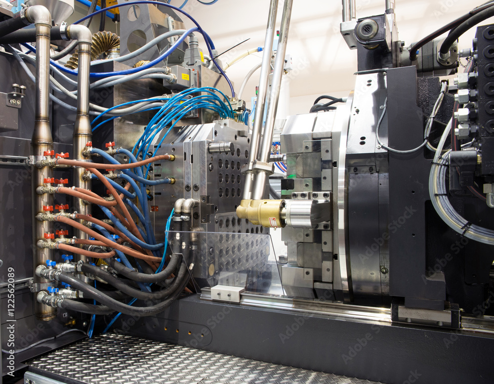 Injection molding machines in a large factory Injection molding machines in a large factory