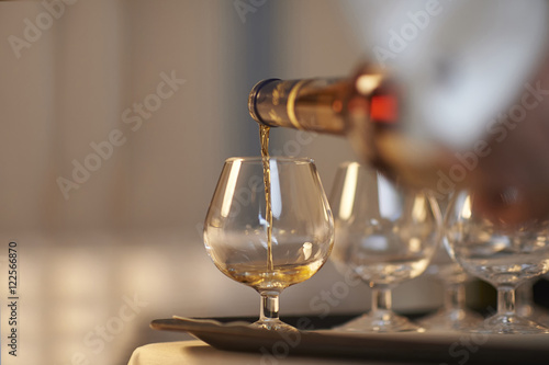 Brandy poured into glass