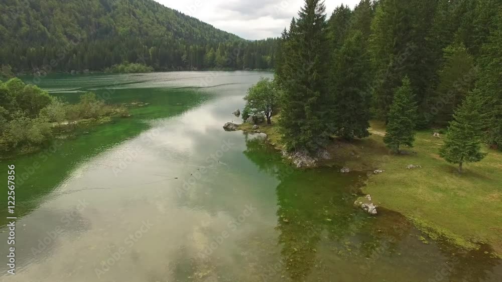 Camera flying above beautiful and clear Belopeska Lake in Italy Camera flying above beautiful and clear Belopeska Lake in Italy