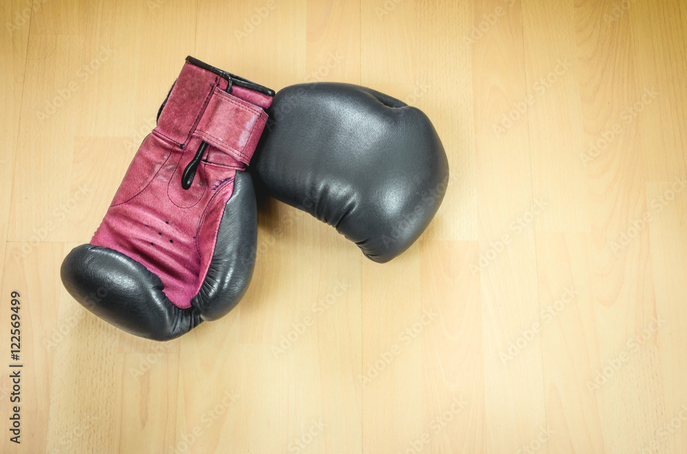 boxing gloves/boxing gloves on a wooden background