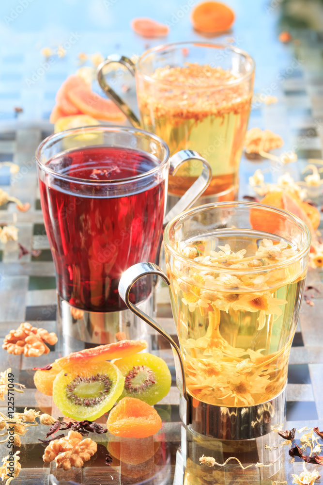 Concept of herbal tea. Variety of herbal teas in glass mugs. Hea Concept of herbal tea. Variety of herbal teas in glass mugs. Hea