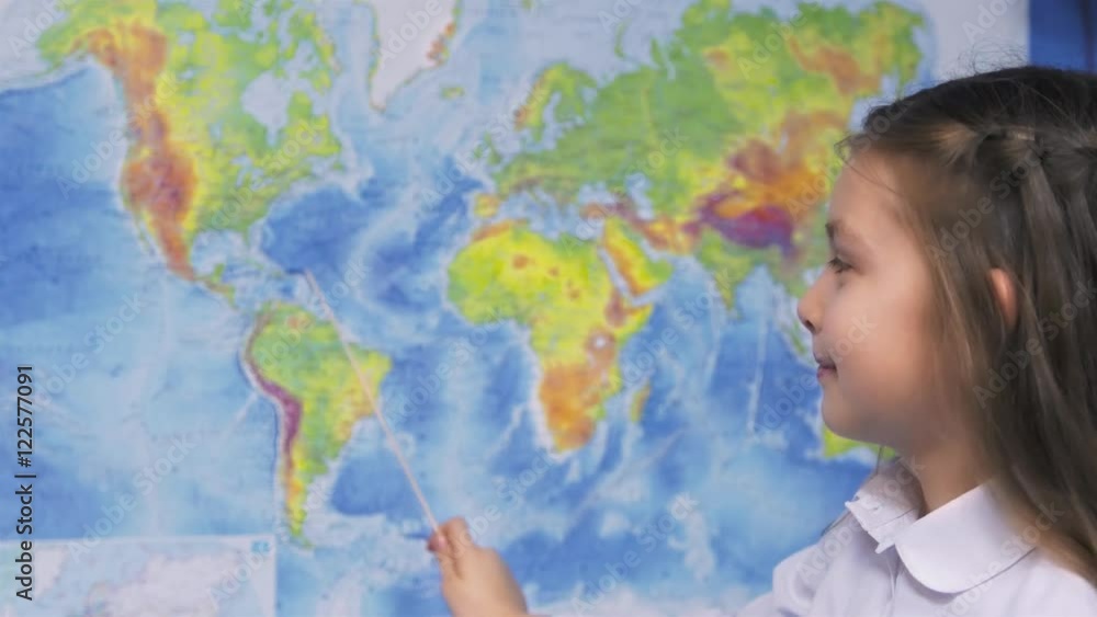 Girl with World Map in Classroom Girl with World Map in Classroom