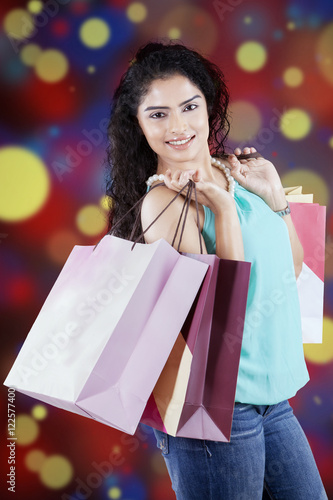 Beautiful shopaholic with shopping bags