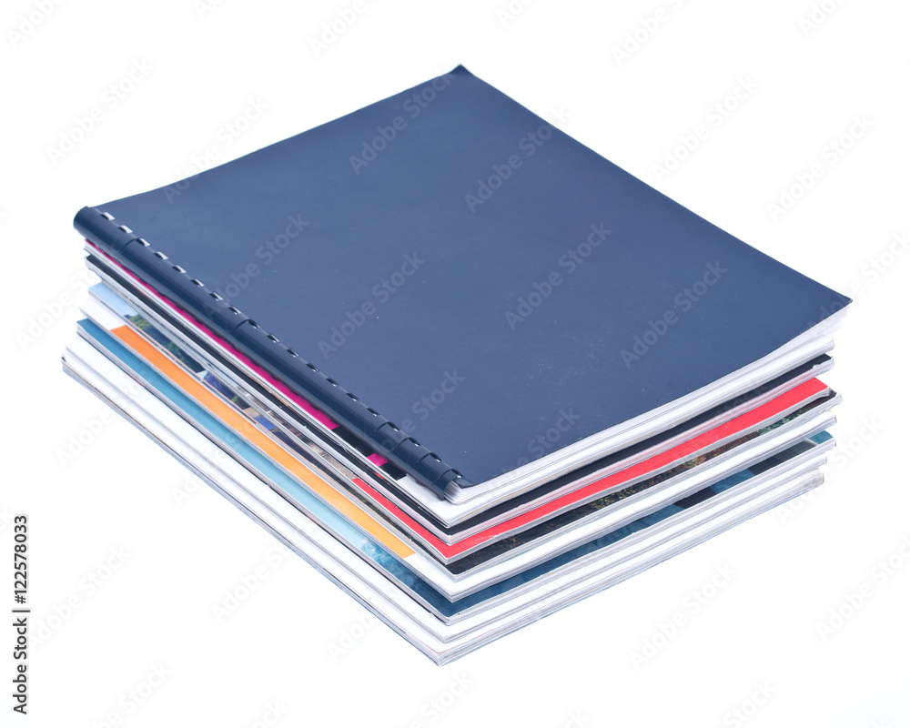 Pile of magazines separated on white background Pile of magazines separated on white background