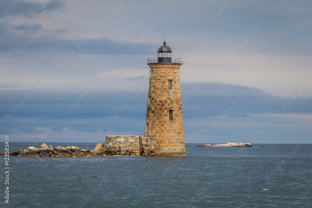 Whaleback Lighthouse in Kittery, Maine, on a cloudy foggy day in early Fall