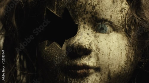 Broken glass doll that is evil looking