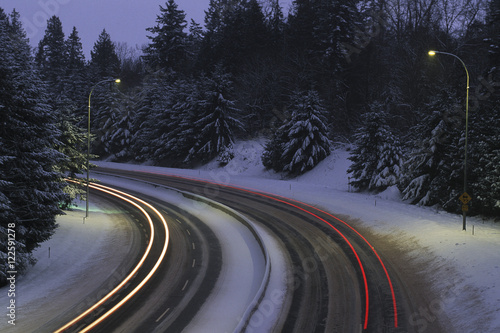 Freeway traffic at night_ Time exposure with light trails, British Columbia, Canada. photo