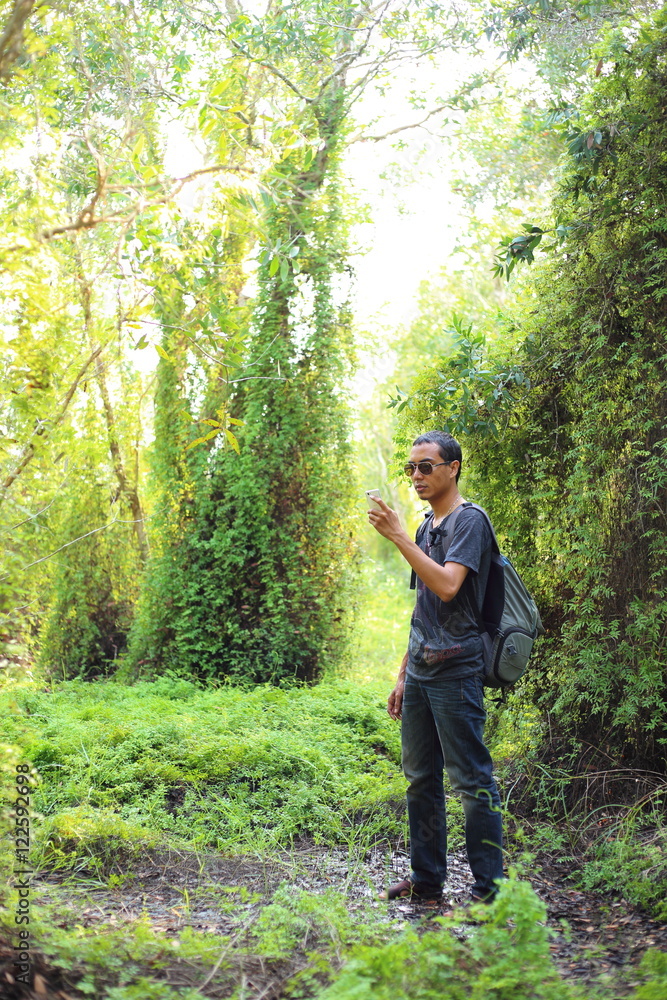 Man and Green Wetland Forest in Rayong at Thailand Man and Green Wetland Forest in Rayong at Thailand