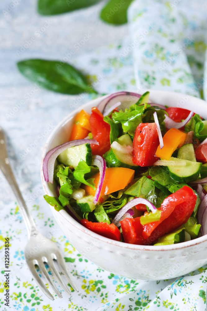 Vegetable salad with spinach, tomato and cucumber Vegetable salad with spinach, tomato and cucumber