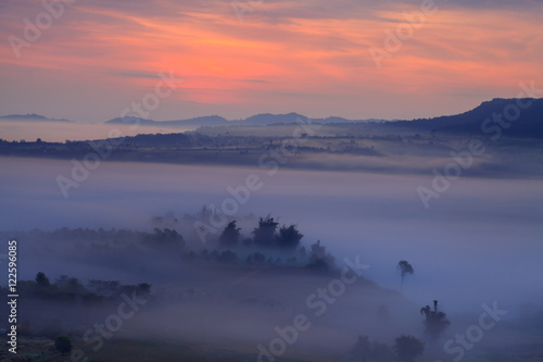 Misty morning sunrise in Khao Takhian Ngo View Point at Khao-kho