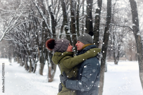 couple lovers kiss winter street