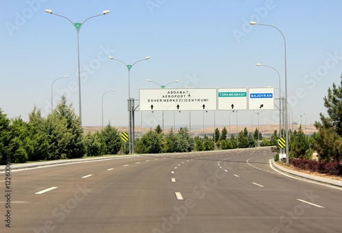 Road signs against clear blue sky. Ashgabat, Turkmenistan photo