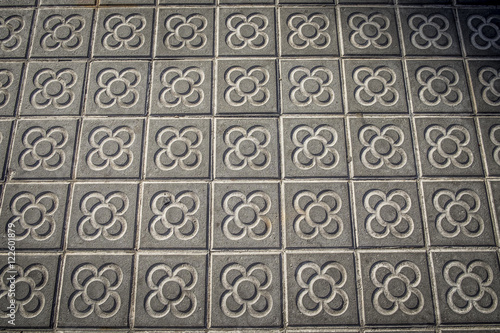 Photography classic tile sidewalks of the city of Barcelona