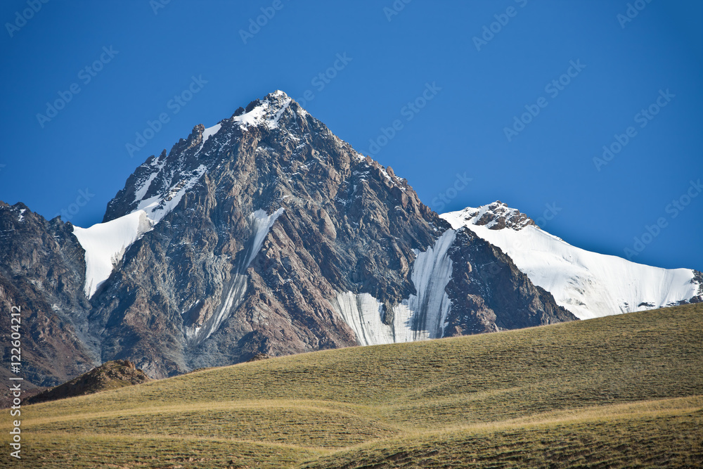 Mountain, cliffs, glaciers and snowfields in the Tien Shan