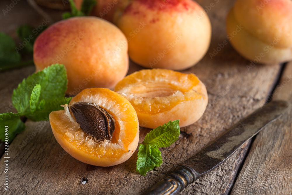 Fresh apricots on the wooden rustic table