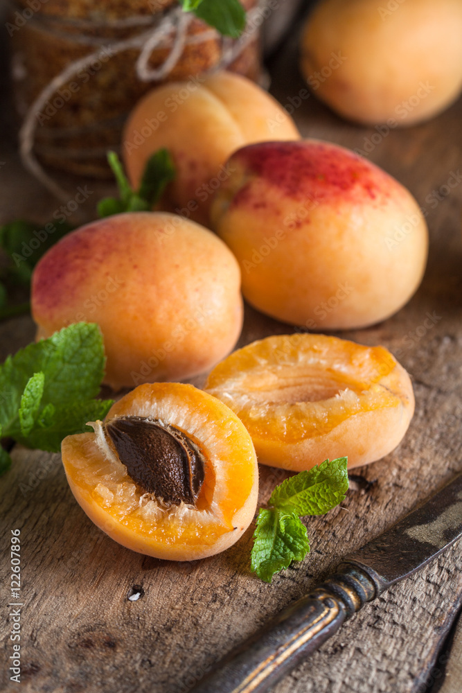 Fresh apricots on the wooden rustic table