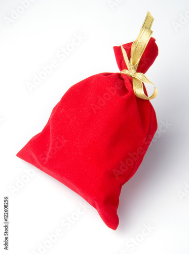 red bag for gift with gold ribbon