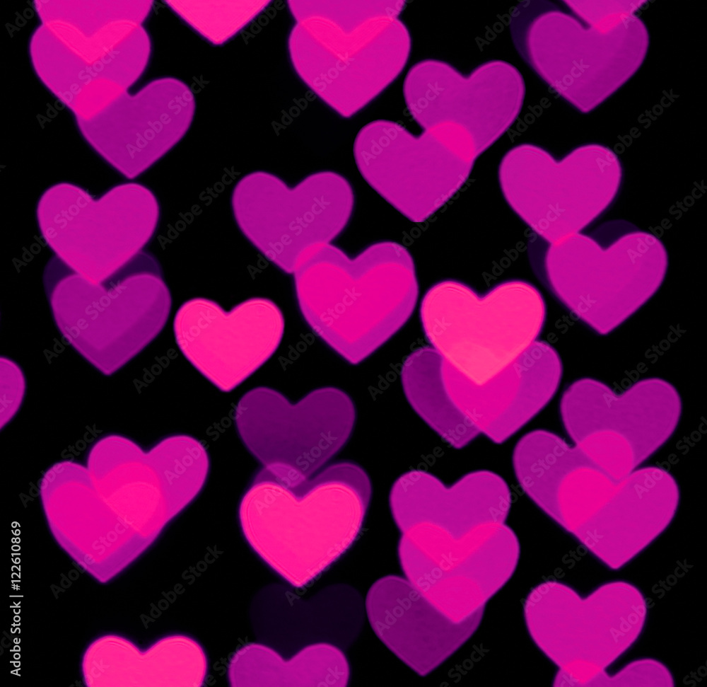 heart bokeh background, photo blurry objects, pink on black