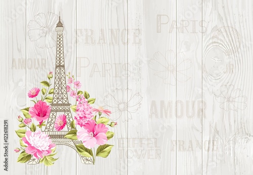 Eiffel tower icon with spring blooming flowers over gray text pattern with sign Paris souvenir. Vector illustration.