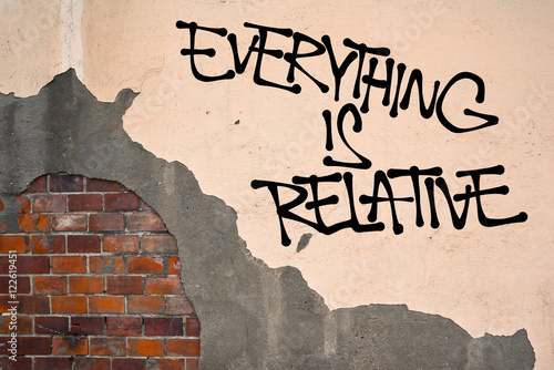 Everything Is Relative - Handwritten graffiti sprayed on the wall, anarchist aesthetics. Postmodern relativization of morality, ethics, values. Everything is personal arbitrary opinion