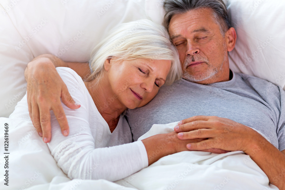 Senior couple sleeping in bed
Senior couple sleeping in bed