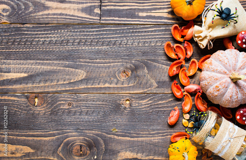 Halloween pumpkins, on wooden background