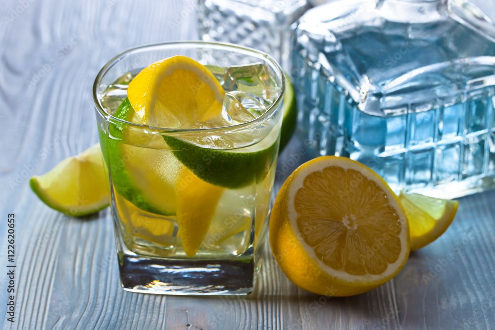 drink with lemon , lime and ice drink with lemon , lime and ice