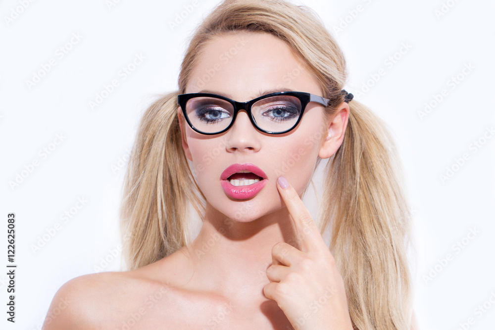 Sexy blonde woman in glasses with double ponytail Stock Photo Adobe Stock