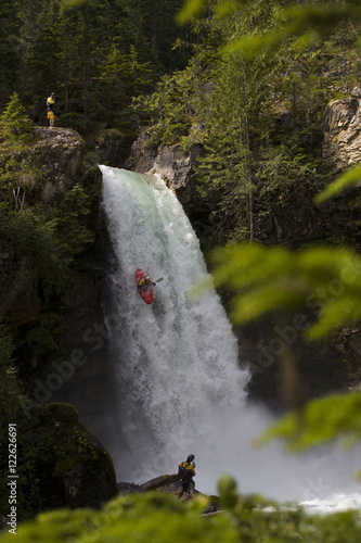 A kayaker drops Sutherland Falls - 60ft, Revelstoke, BC photo