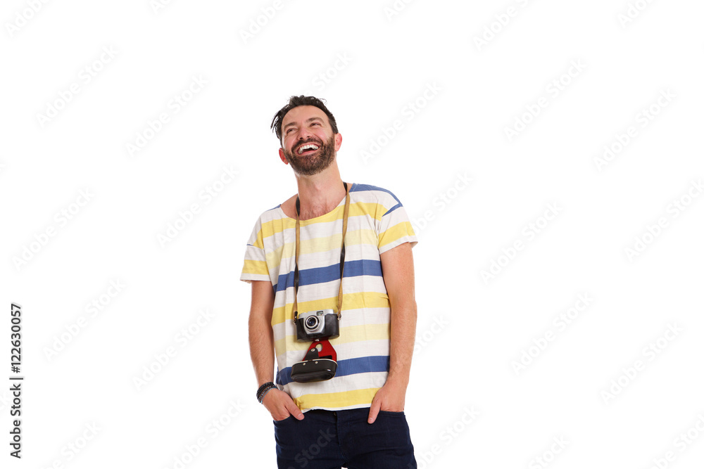 Mature man with an old camera standing relaxed Mature man with an old camera standing relaxed