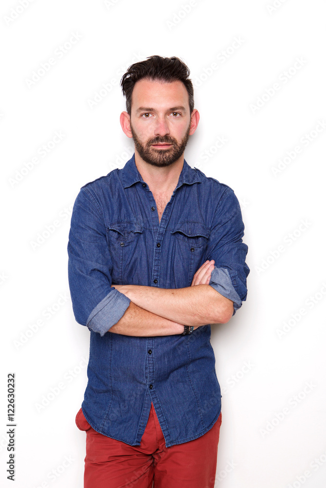 Handsome mature guy posing with arms crossed Handsome mature guy posing with arms crossed