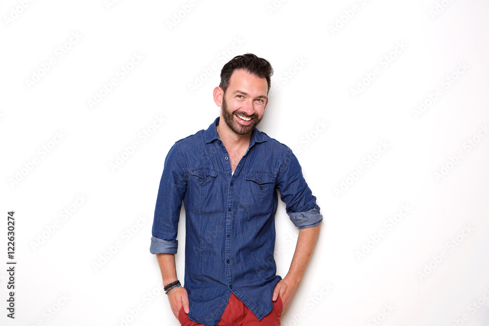 Happy mature fashion model posing with hands in pocket