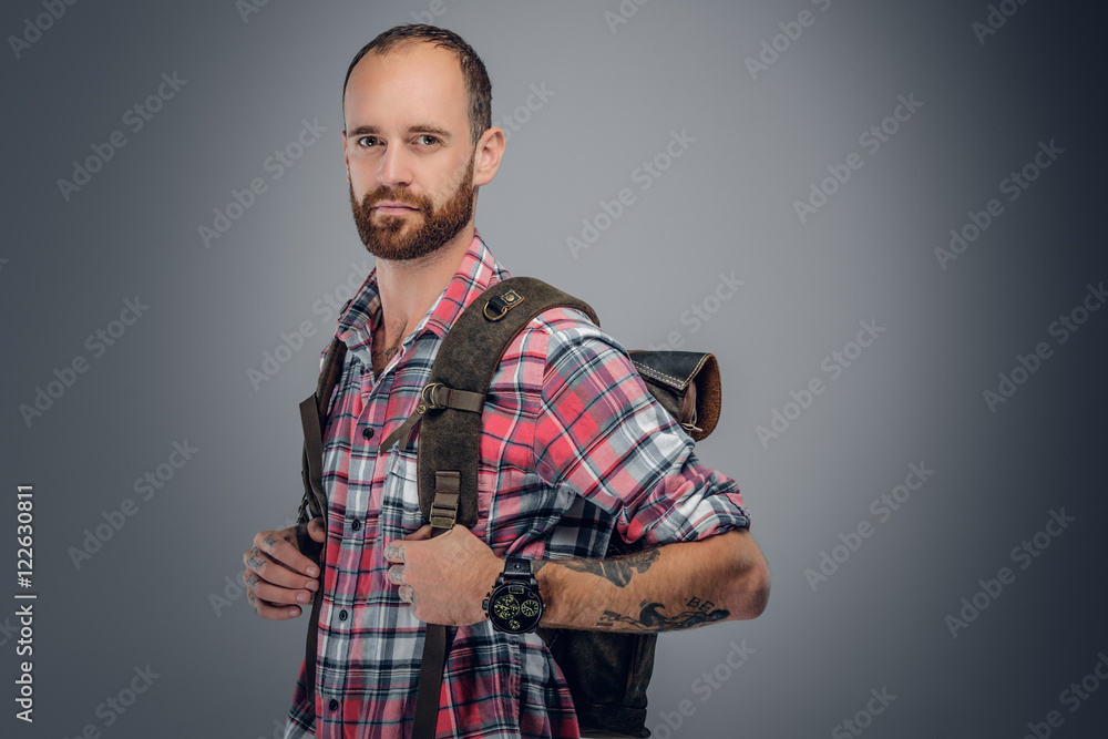 Portrait of a bearded traveller male with backpack. Portrait of a bearded traveller male with backpack.