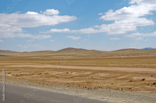blue sky over the vast Mongolian steppes
