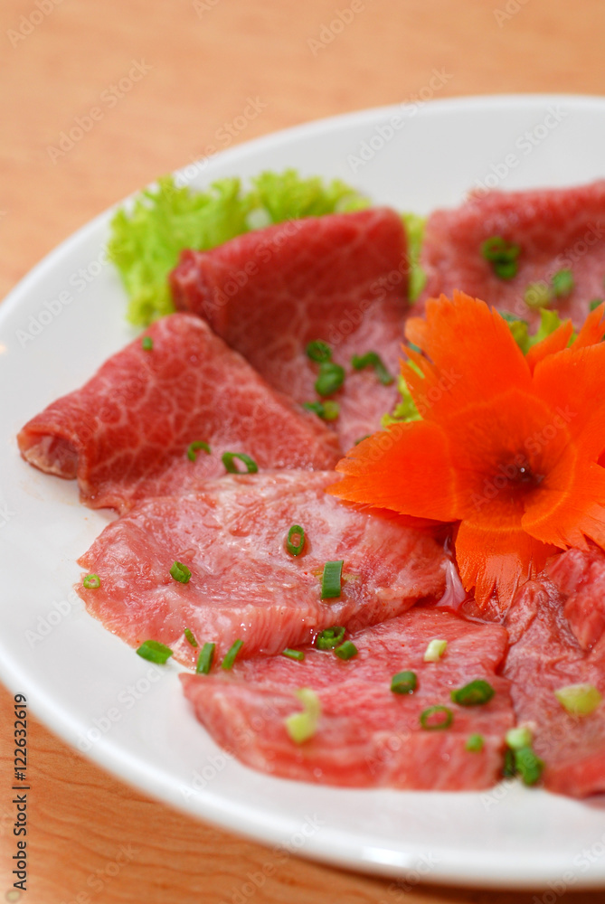 Premium raw japanese beef sliced on plate