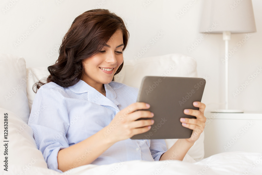 happy pregnant woman with tablet pc at home happy pregnant woman with tablet pc at home