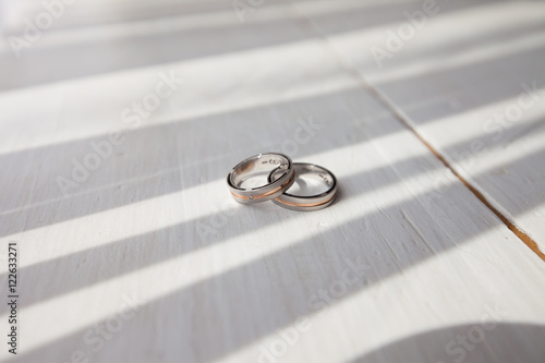 two wedding rings and beautiful shadow
